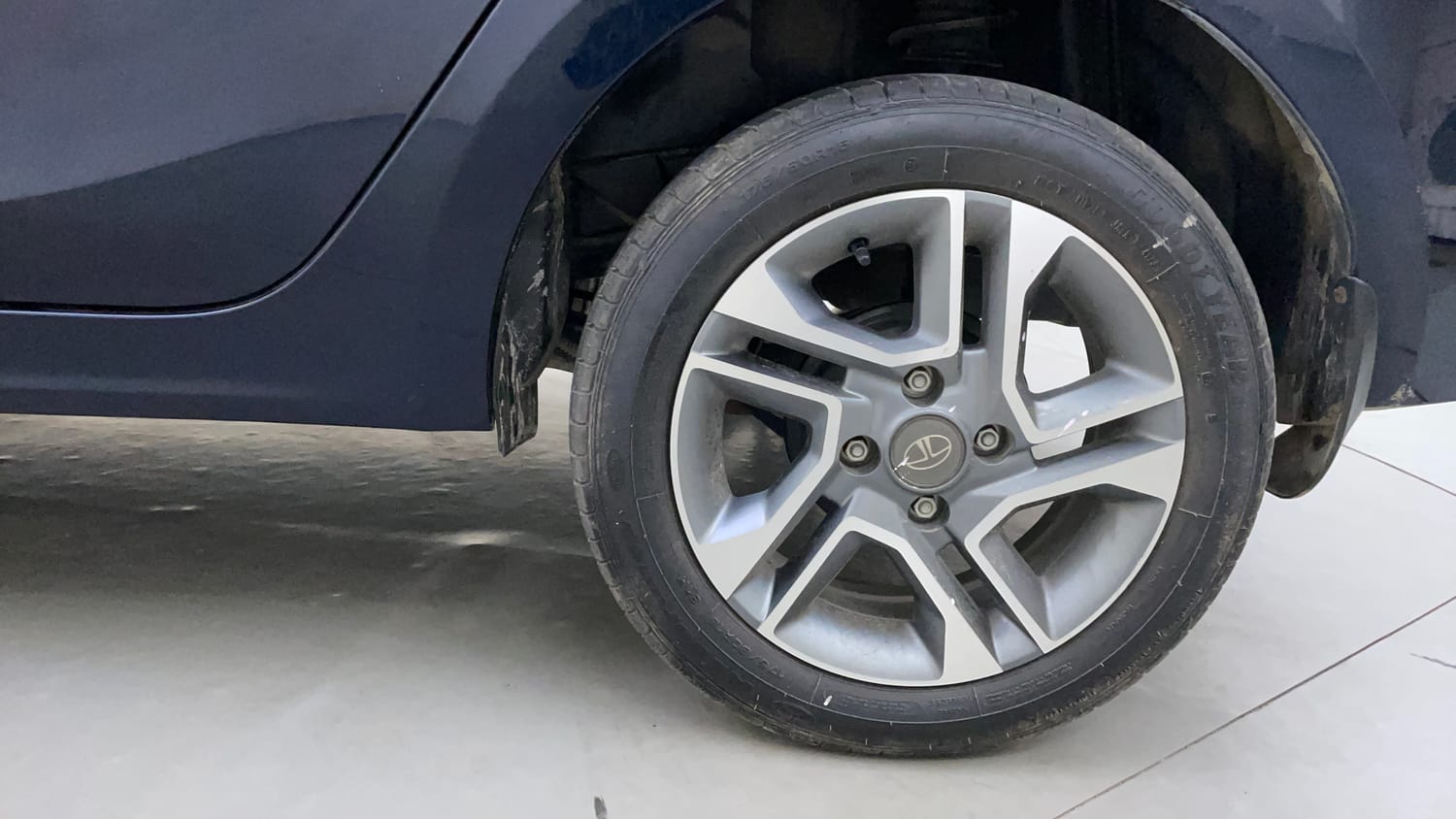 Used 2023 Tata Tigor XZ Plus Petrol Manual tyres LEFT REAR TYRE RIM VIEW