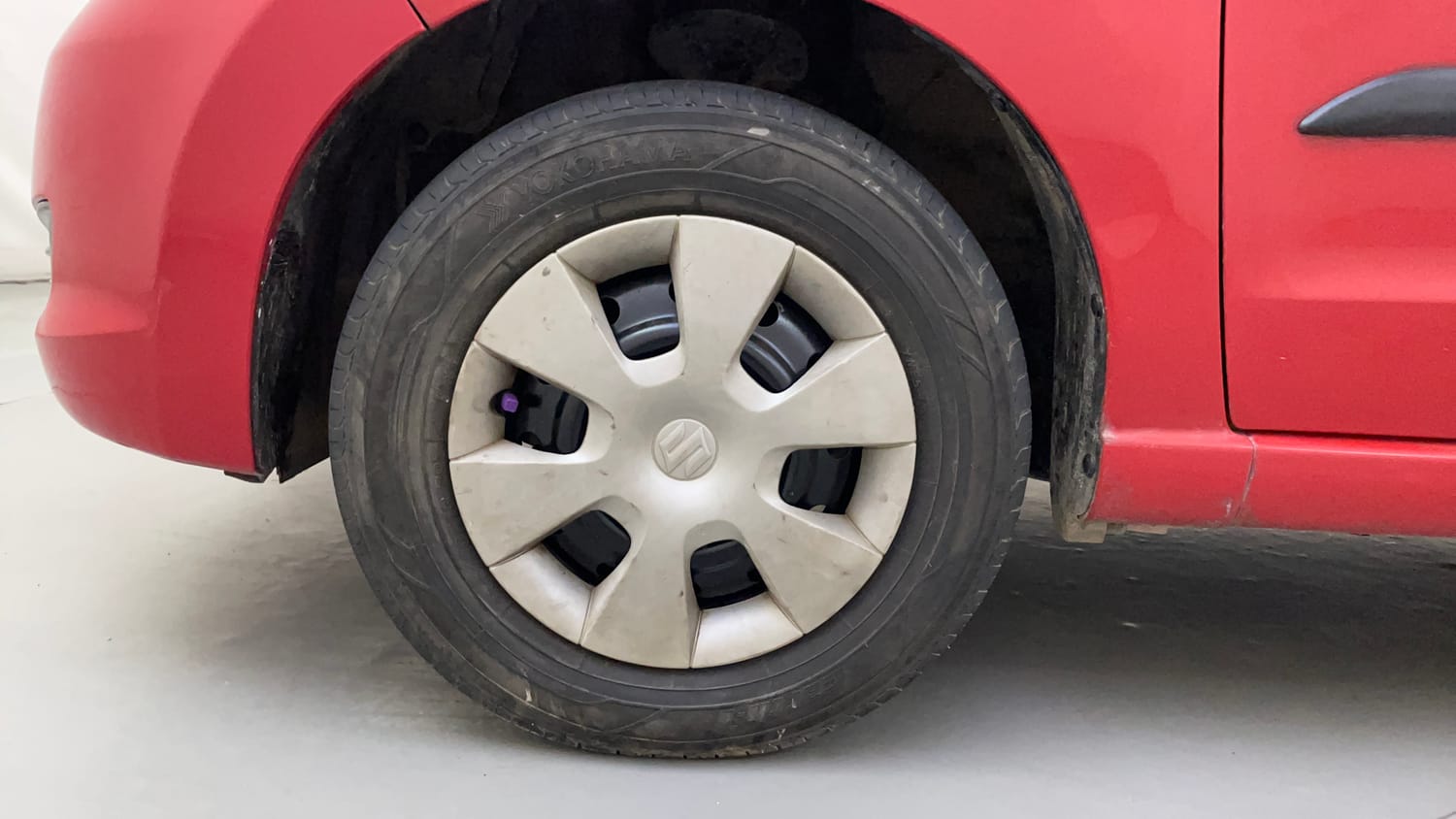 Used 2013 Maruti Suzuki A-Star Vxi Petrol Manual tyres LEFT FRONT TYRE RIM VIEW