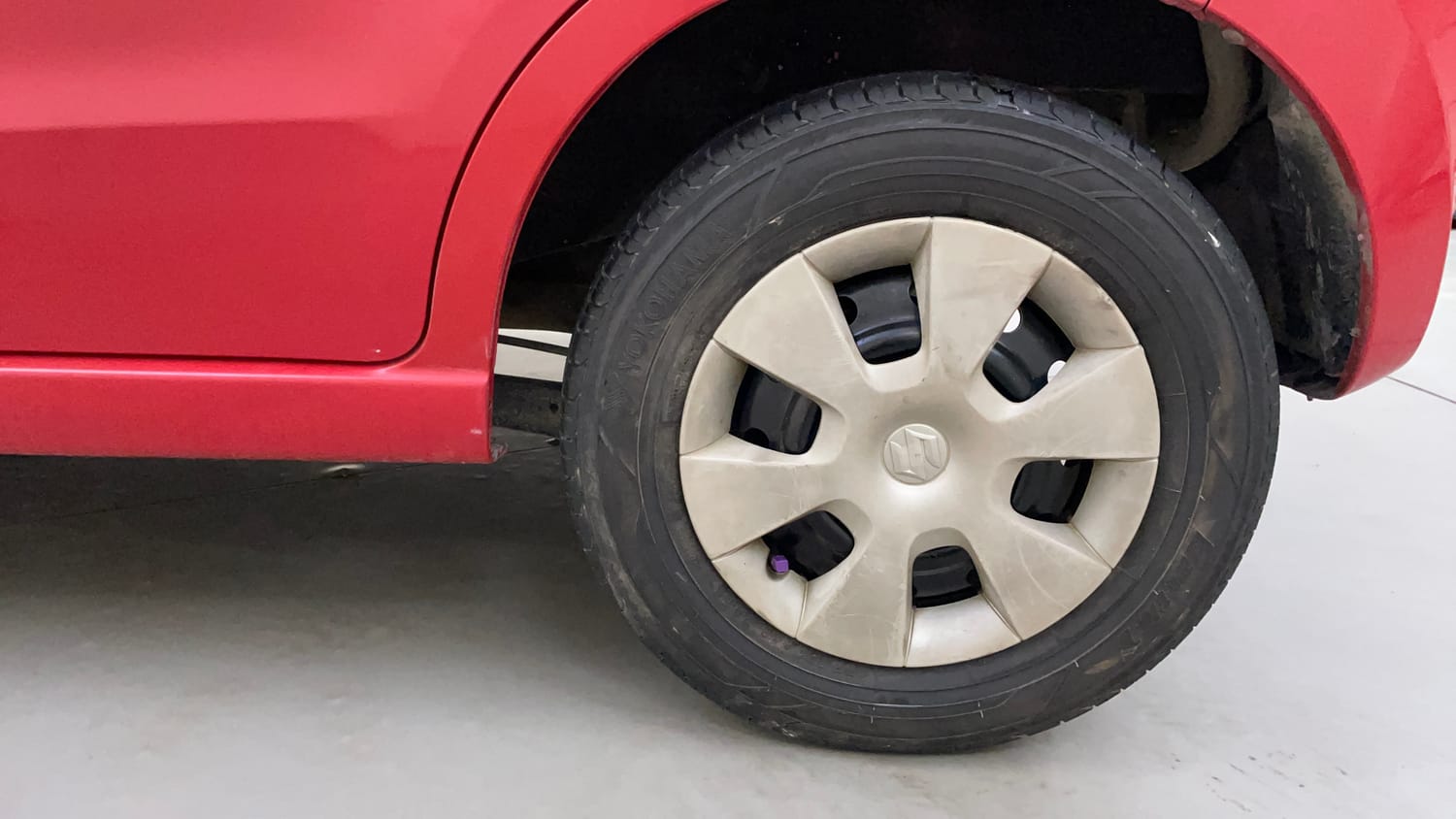 Used 2013 Maruti Suzuki A-Star Vxi Petrol Manual tyres LEFT REAR TYRE RIM VIEW