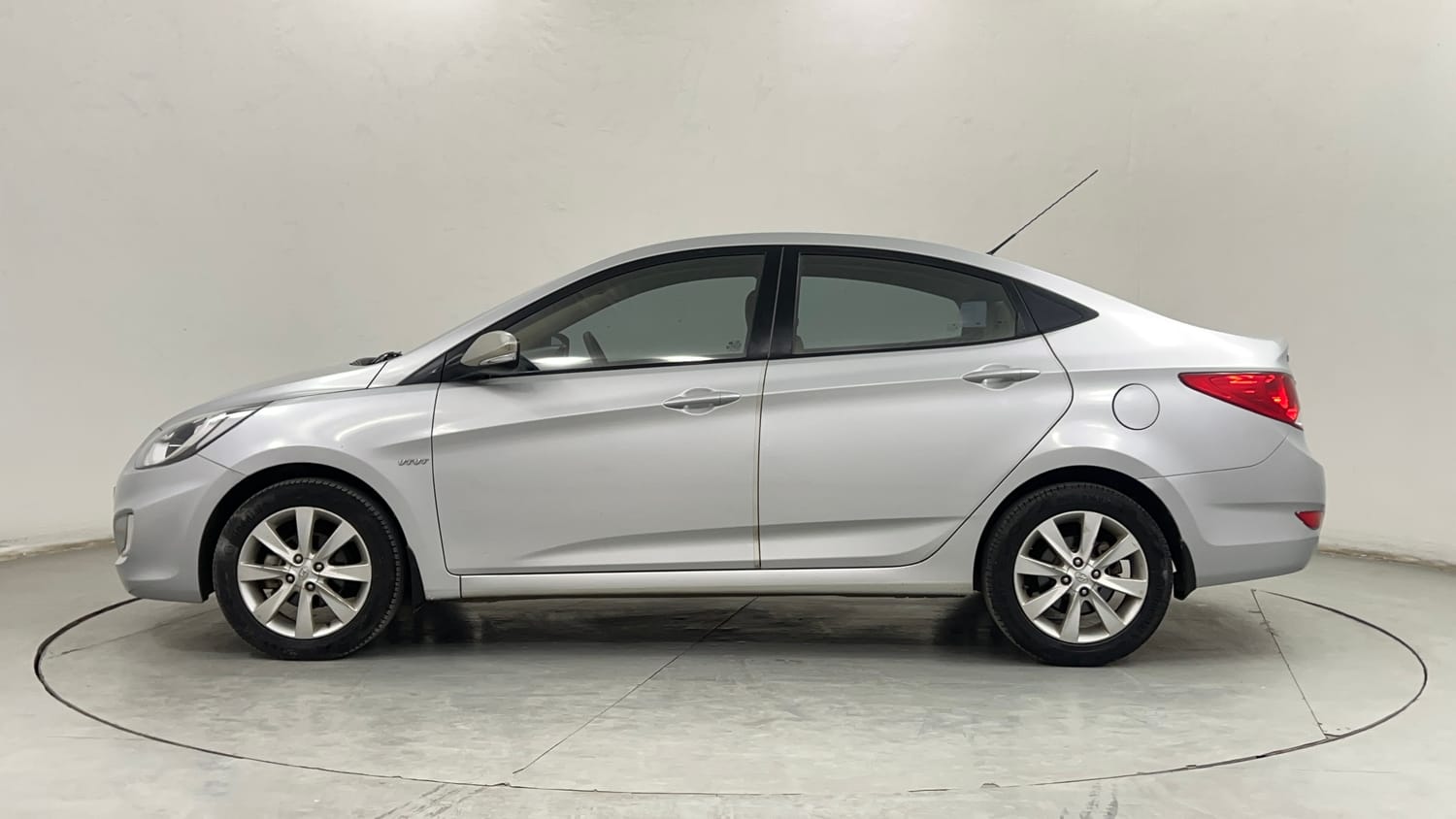 Used 2012 Hyundai Verna Fluidic 1.6 VTVT SX Petrol Manual exterior LEFT SIDE VIEW