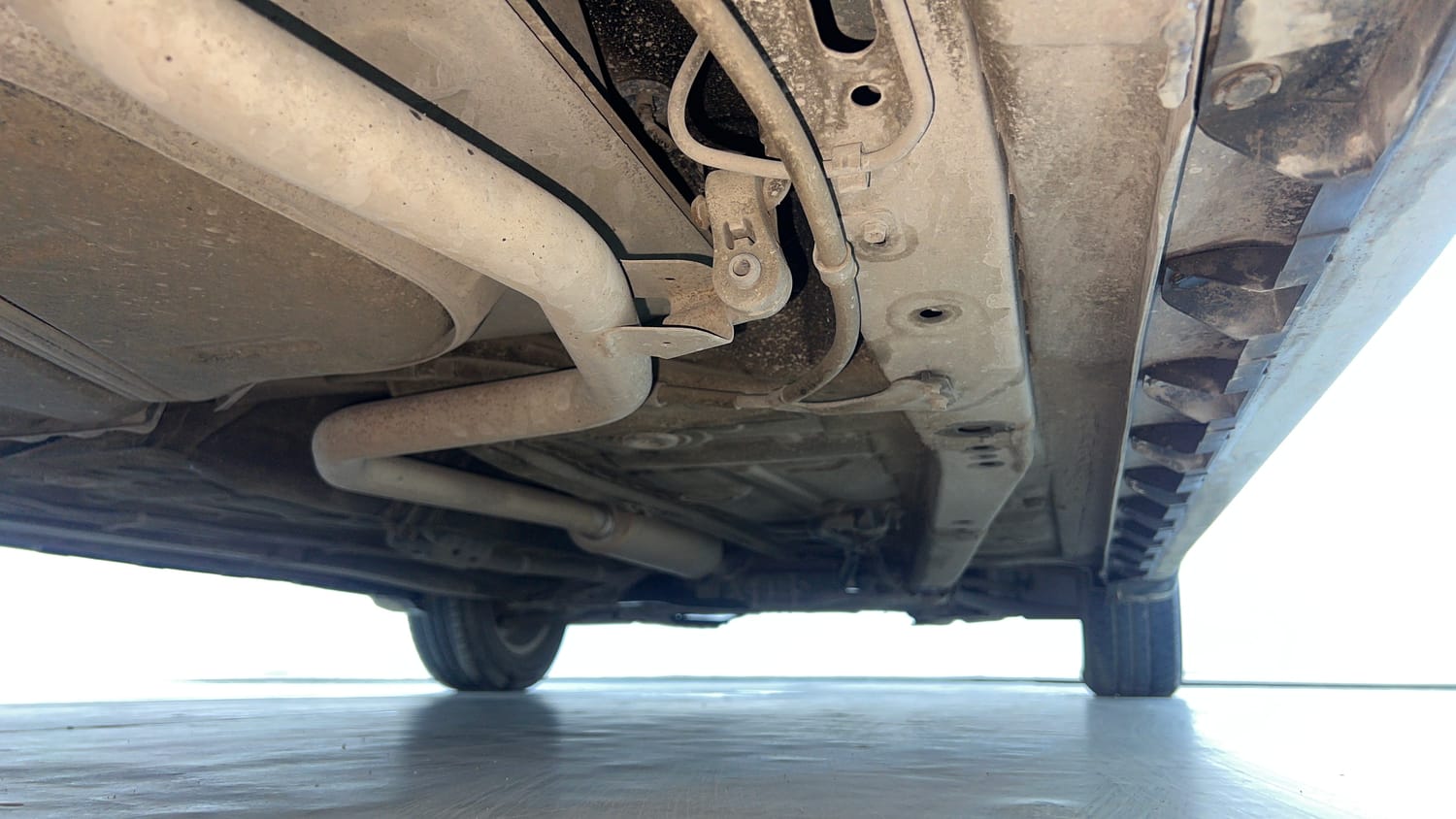 Used 2022 Maruti Suzuki XL6 Zeta AT Petrol Petrol Automatic extra REAR RIGHT UNDERBODY VIEW