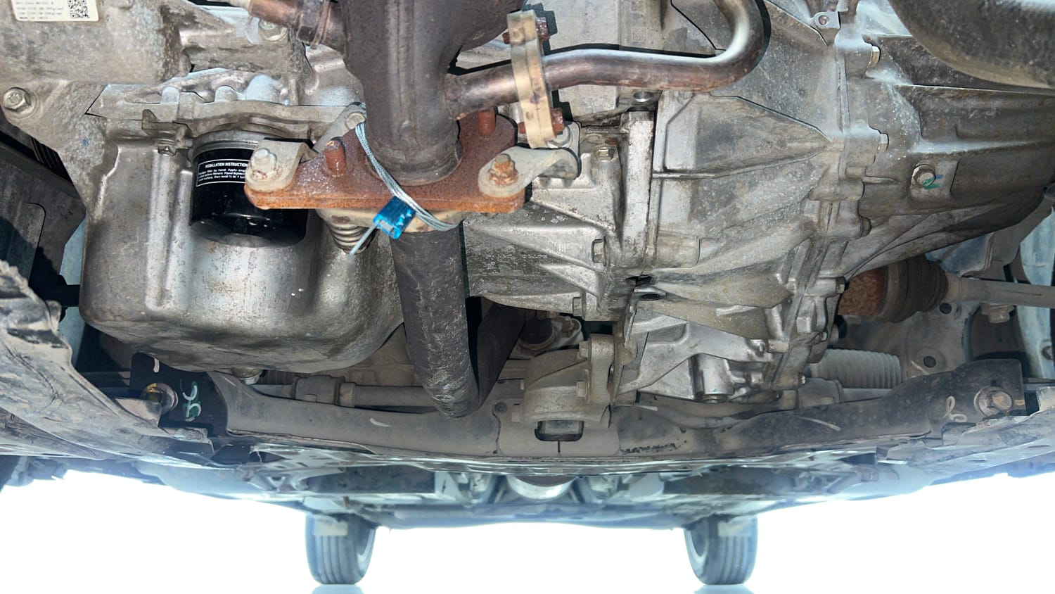 Used 2022 Maruti Suzuki Baleno Alpha MT Petrol Manual extra FRONT LEFT UNDERBODY VIEW