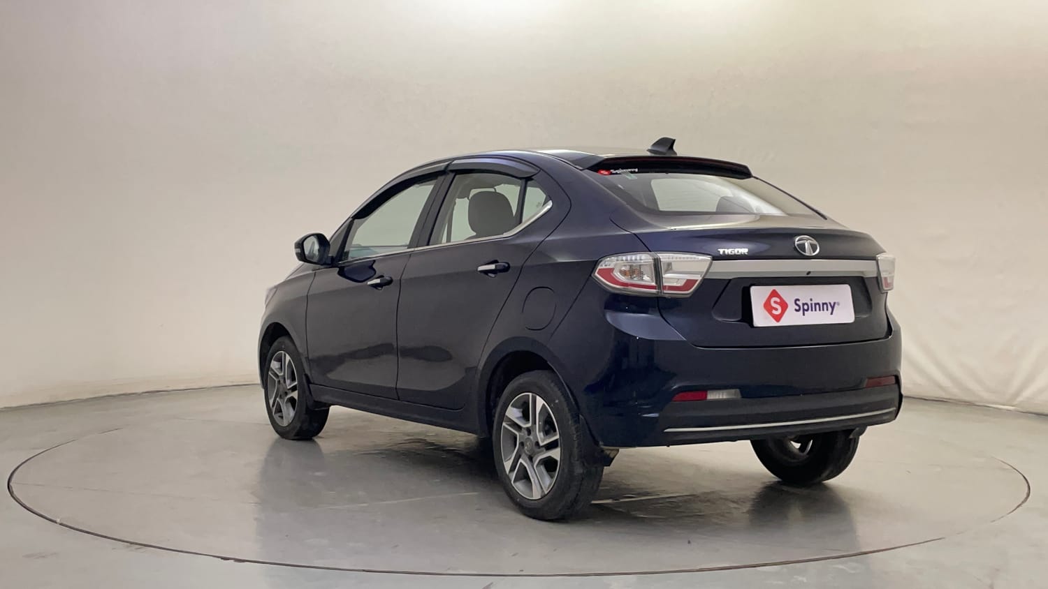 Used 2023 Tata Tigor XZ Plus Petrol Manual exterior LEFT REAR CORNER VIEW