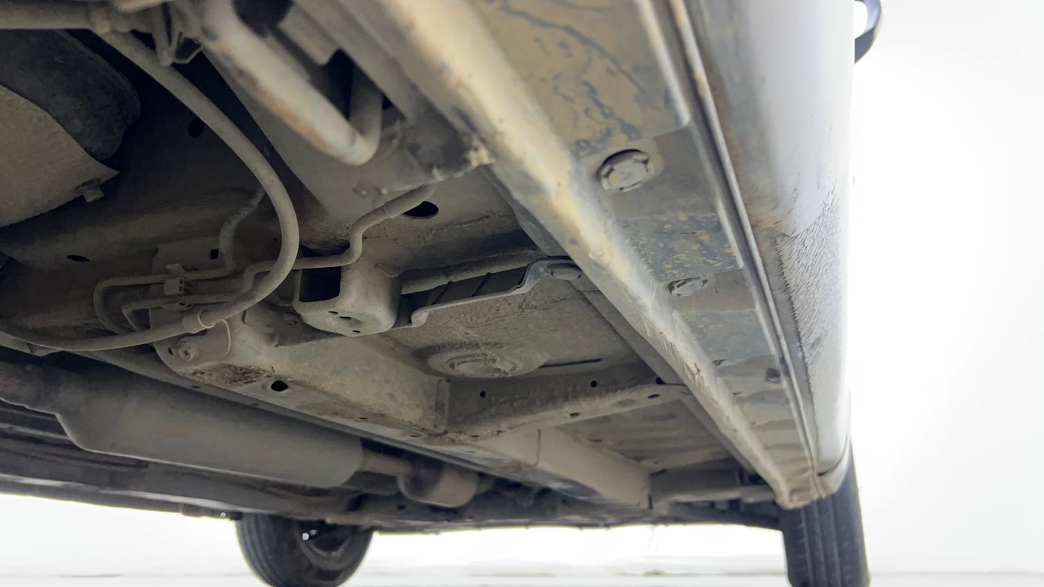 Used 2016 Maruti Suzuki Swift Dzire VXI Petrol + CNG (Outside Fitted) Cng Manual extra REAR RIGHT UNDERBODY VIEW
