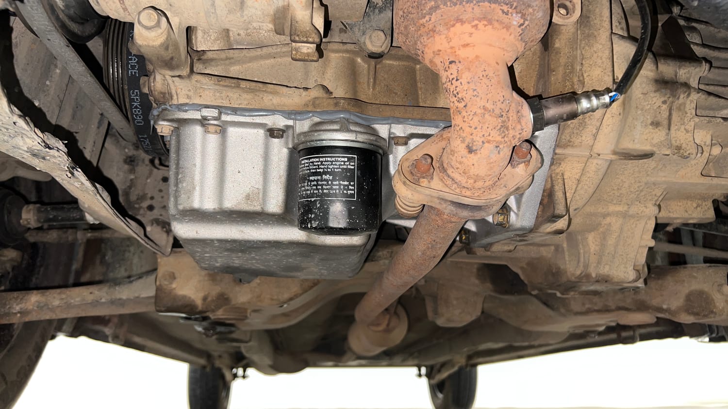 Used 2013 Maruti Suzuki Wagon R VXI Petrol Manual extra FRONT LEFT UNDERBODY VIEW