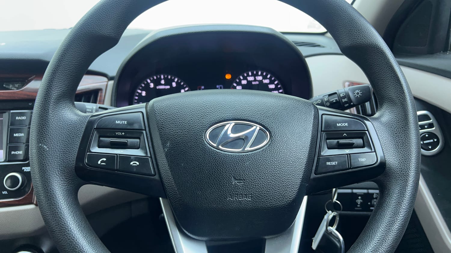 Used 2019 Hyundai Creta EX 1.6 Petrol Petrol Manual top_features Steering mounted controls