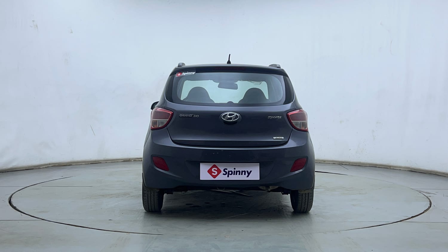 Used 2014 Hyundai Grand i10 Sportz AT 1.2 Kappa VTVT Petrol Automatic exterior BACK VIEW