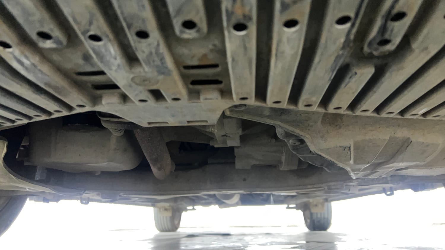 Used 2019 Maruti Suzuki Ciaz Alpha Hybrid 1.5 AT Petrol Automatic extra FRONT LEFT UNDERBODY VIEW