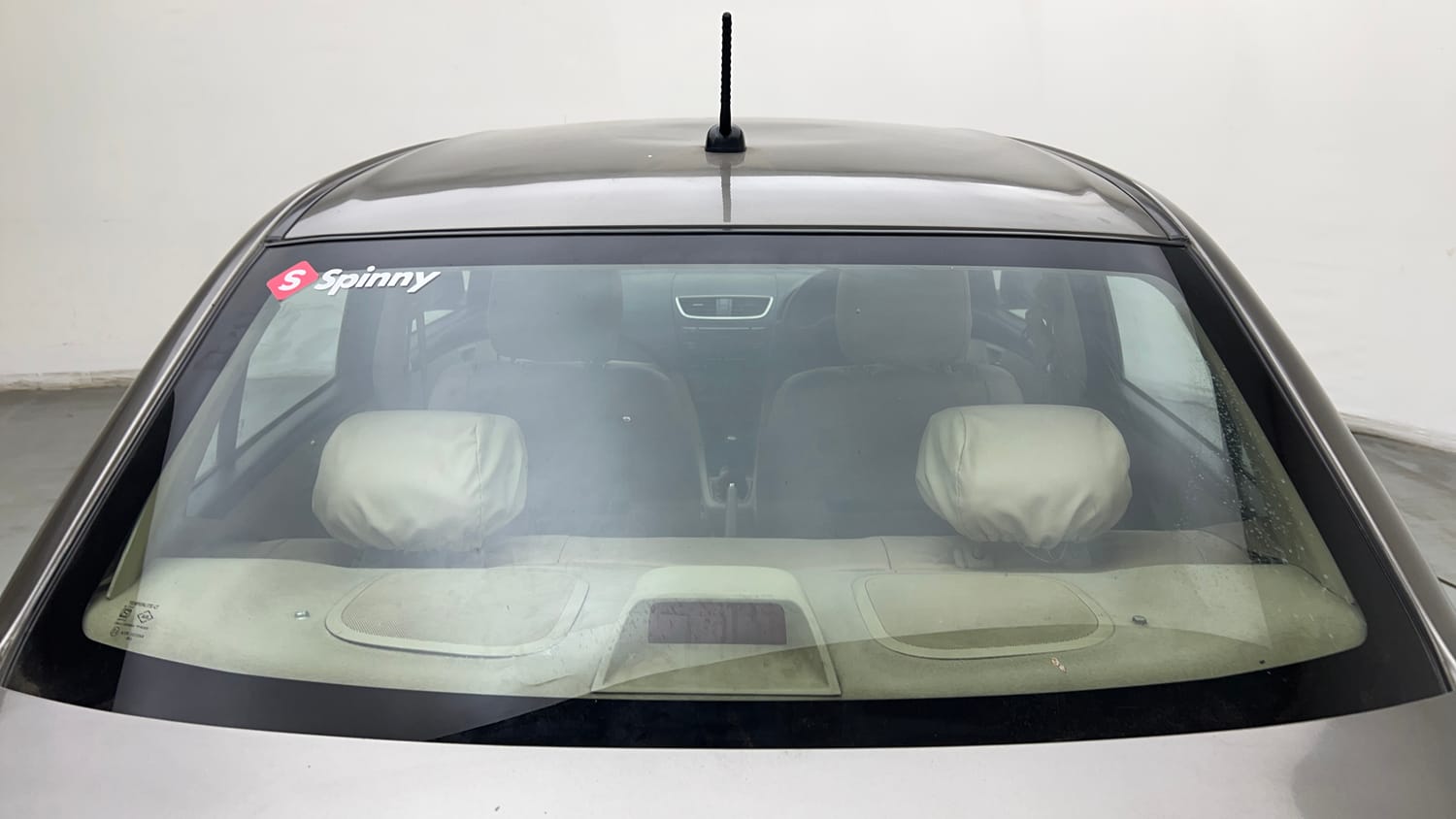 Used 2016 Maruti Suzuki Swift Dzire VXI Petrol + CNG (Outside Fitted) Cng Manual exterior BACK WINDSHIELD VIEW