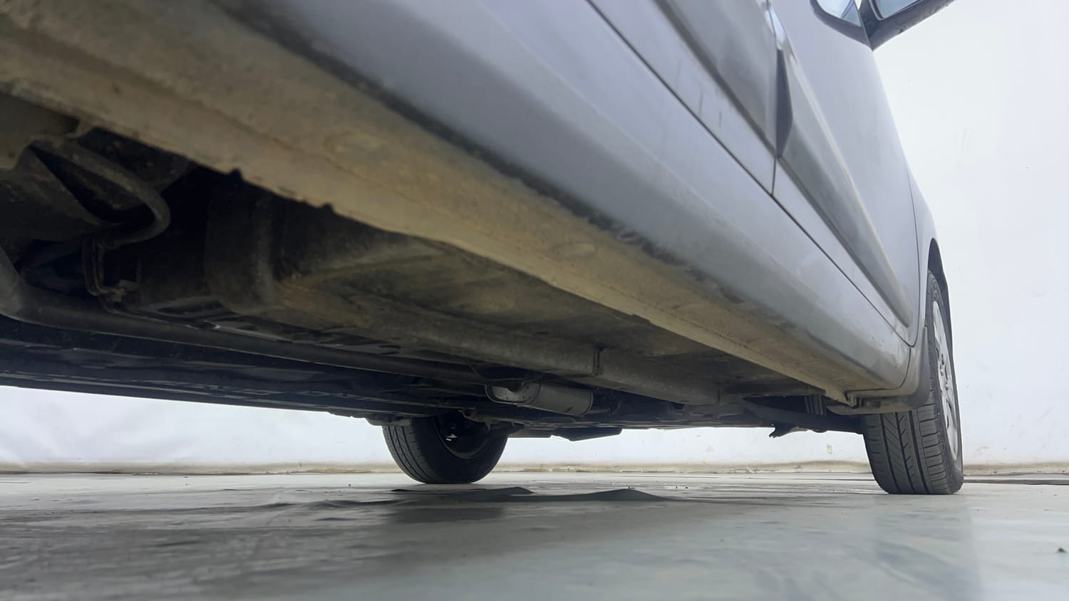 Used 2014 Hyundai Grand i10 Sportz AT 1.2 Kappa VTVT Petrol Automatic extra REAR RIGHT UNDERBODY VIEW