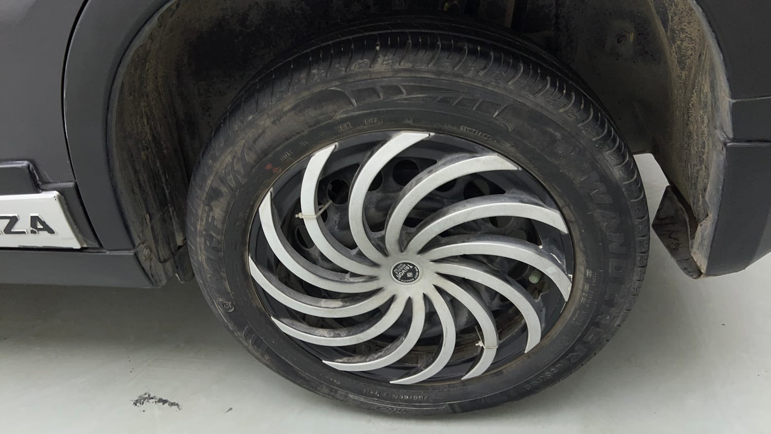 Used 2022 maruti-suzuki Vitara Brezza VXi Petrol Manual tyres LEFT REAR TYRE RIM VIEW