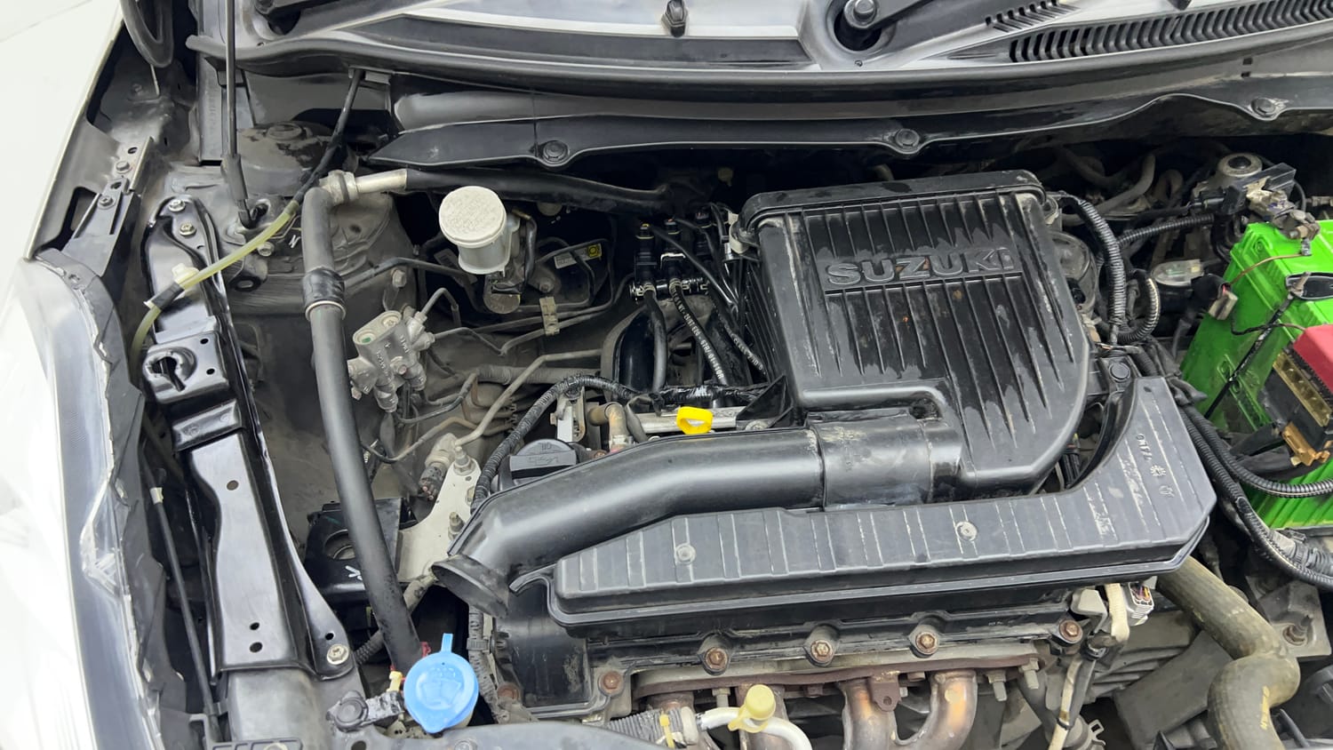 Used 2016 Maruti Suzuki Swift Dzire VXI Petrol + CNG (Outside Fitted) Cng Manual engine ENGINE RIGHT SIDE VIEW