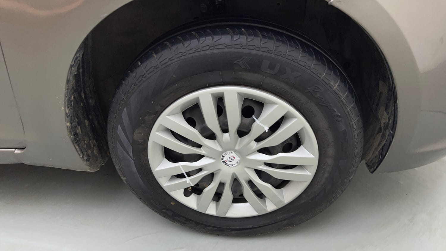 Used 2016 Maruti Suzuki Swift Dzire VXI Petrol + CNG (Outside Fitted) Cng Manual tyres RIGHT FRONT TYRE RIM VIEW