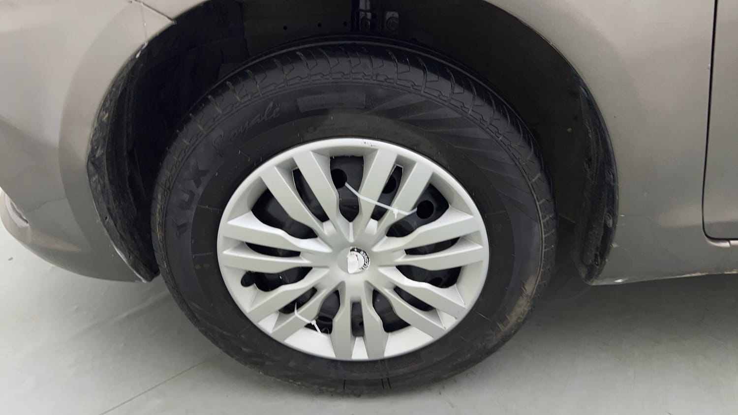 Used 2016 Maruti Suzuki Swift Dzire VXI Petrol + CNG (Outside Fitted) Cng Manual tyres LEFT FRONT TYRE RIM VIEW