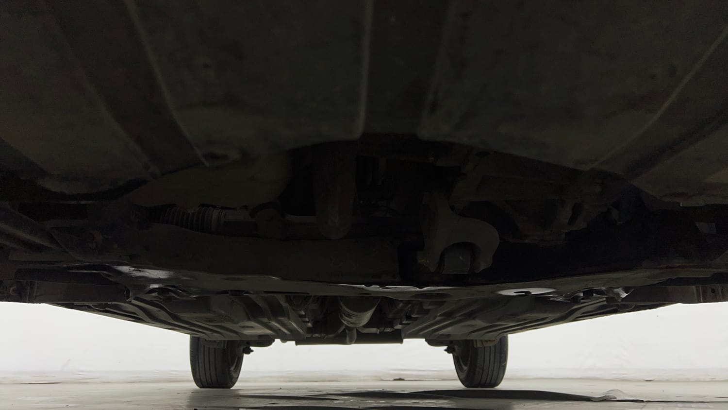 Used 2022 maruti-suzuki Vitara Brezza VXi Petrol Manual extra FRONT LEFT UNDERBODY VIEW