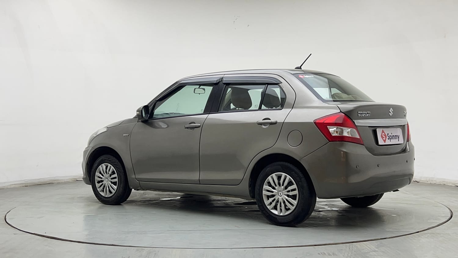 Used 2016 Maruti Suzuki Swift Dzire VXI Petrol + CNG (Outside Fitted) Cng Manual exterior LEFT REAR CORNER VIEW