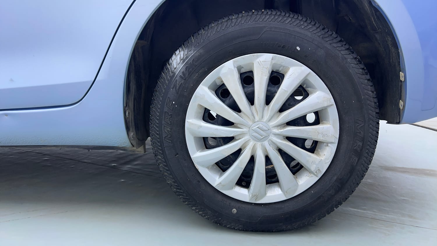 Used 2015 Maruti Suzuki Swift Dzire VXI Petrol Manual tyres LEFT REAR TYRE RIM VIEW
