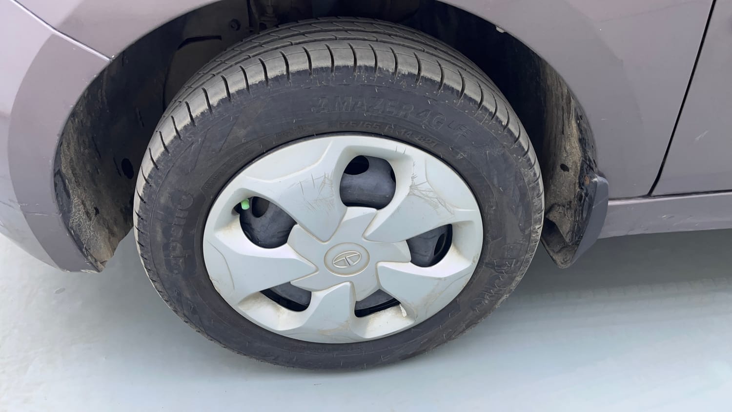 Used 2018 Tata Tiago Revotron XT Petrol Manual tyres LEFT FRONT TYRE RIM VIEW