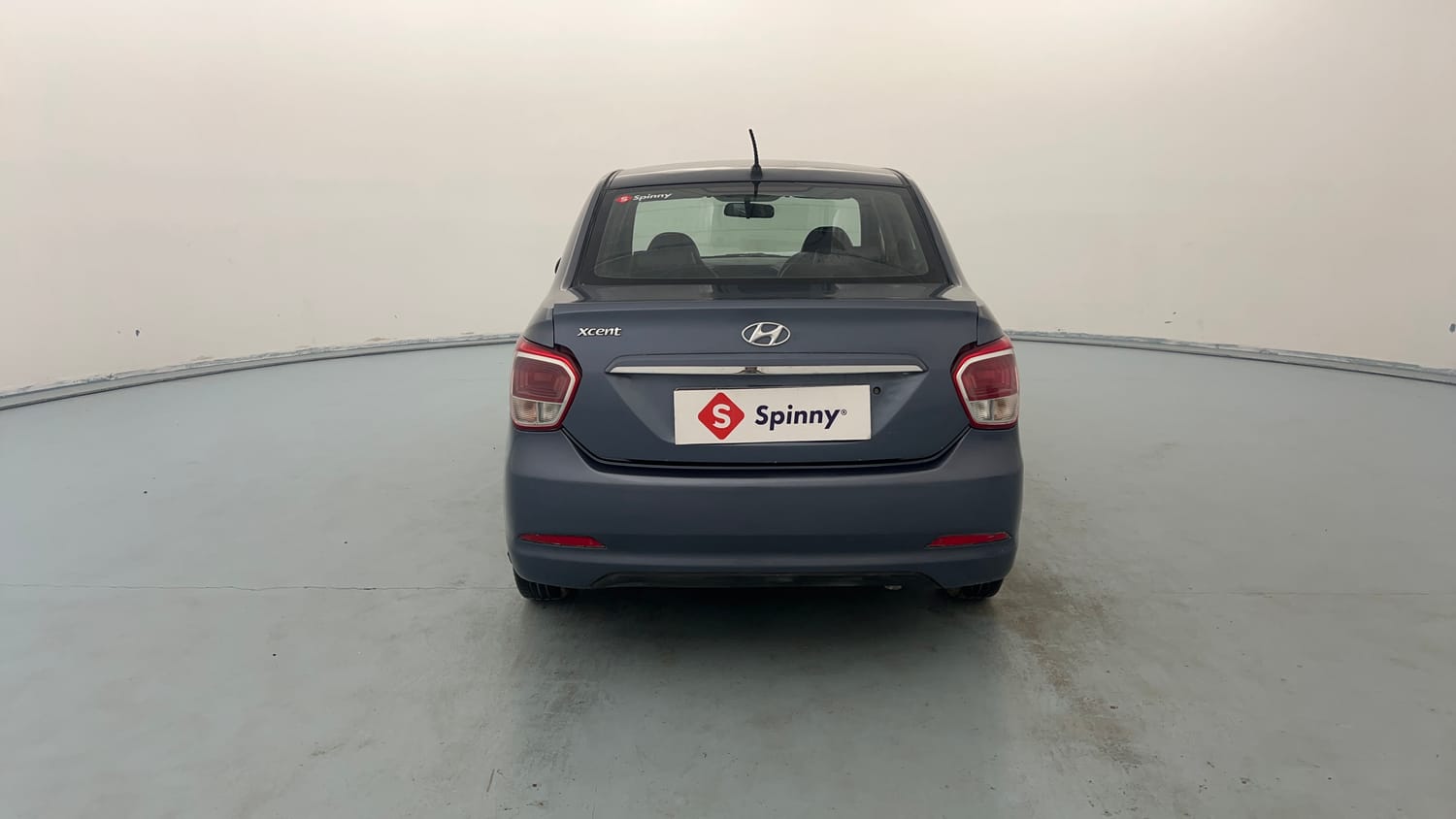 Used 2015 Hyundai Xcent Base 1.2 Petrol Manual exterior BACK VIEW