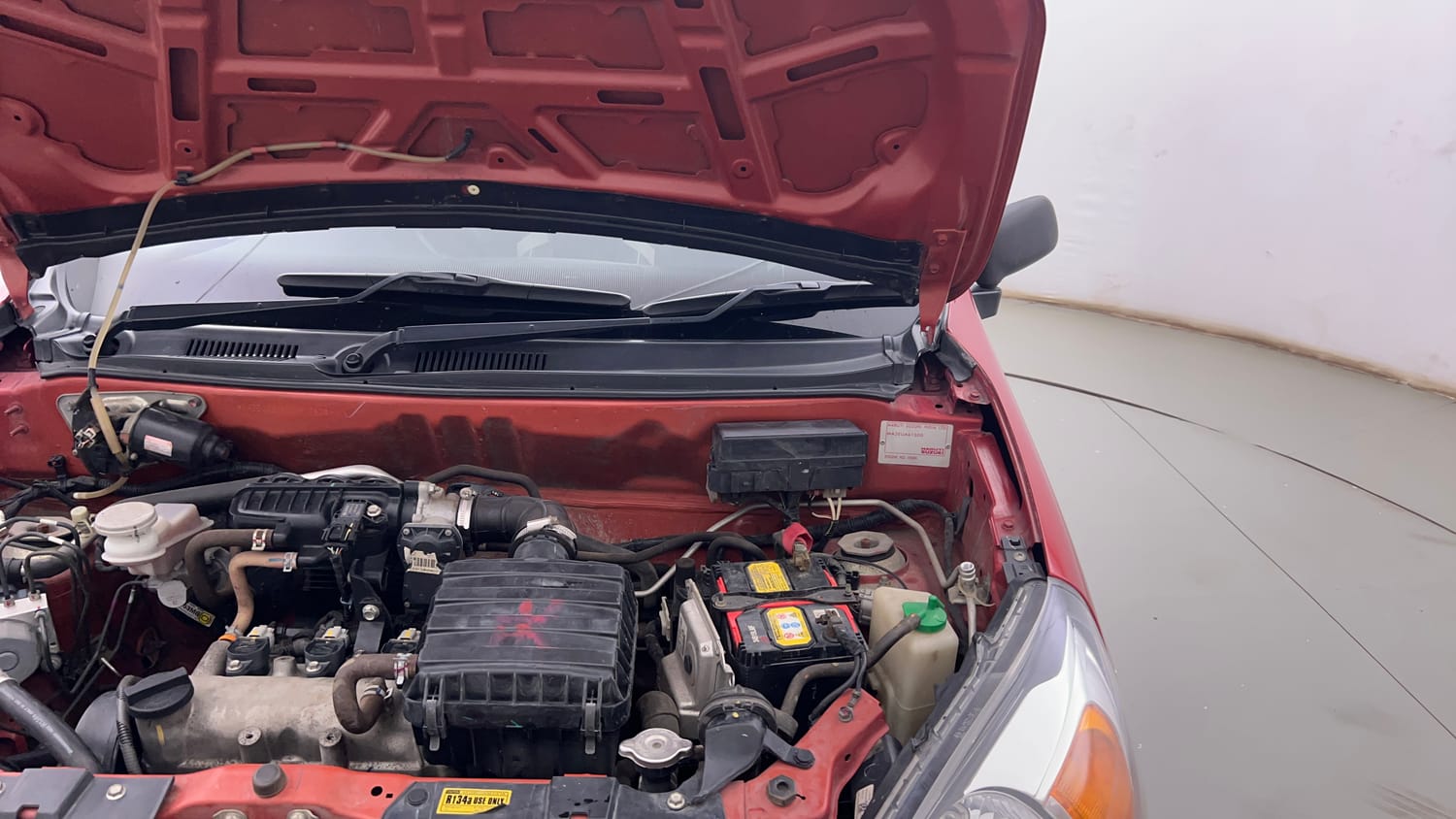 Used 2022 Maruti Suzuki Alto 800 LXi (O) Petrol Manual engine ENGINE LEFT SIDE HINGE & APRON VIEW