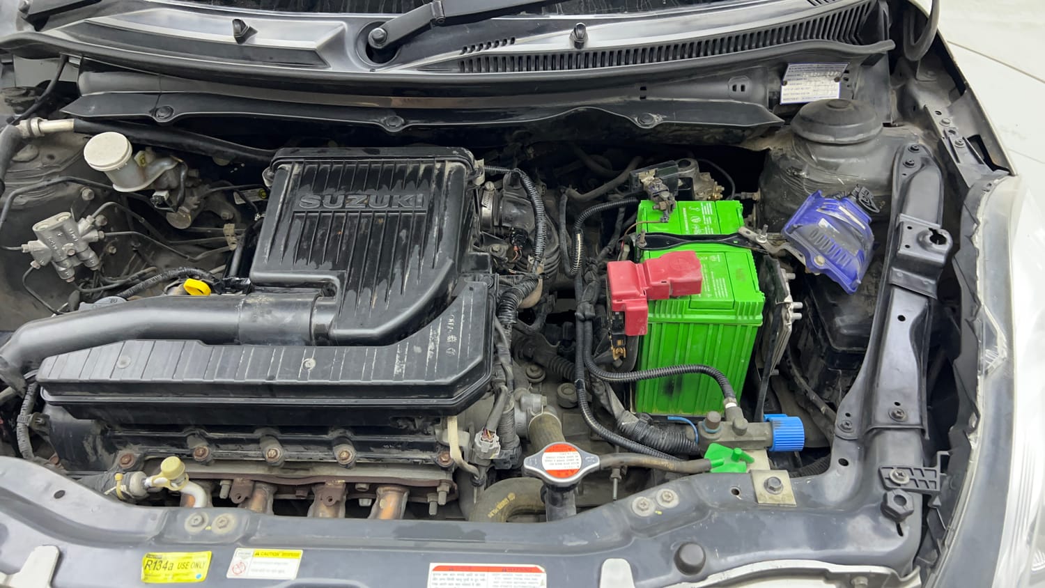 Used 2016 Maruti Suzuki Swift Dzire VXI Petrol + CNG (Outside Fitted) Cng Manual engine ENGINE LEFT SIDE VIEW