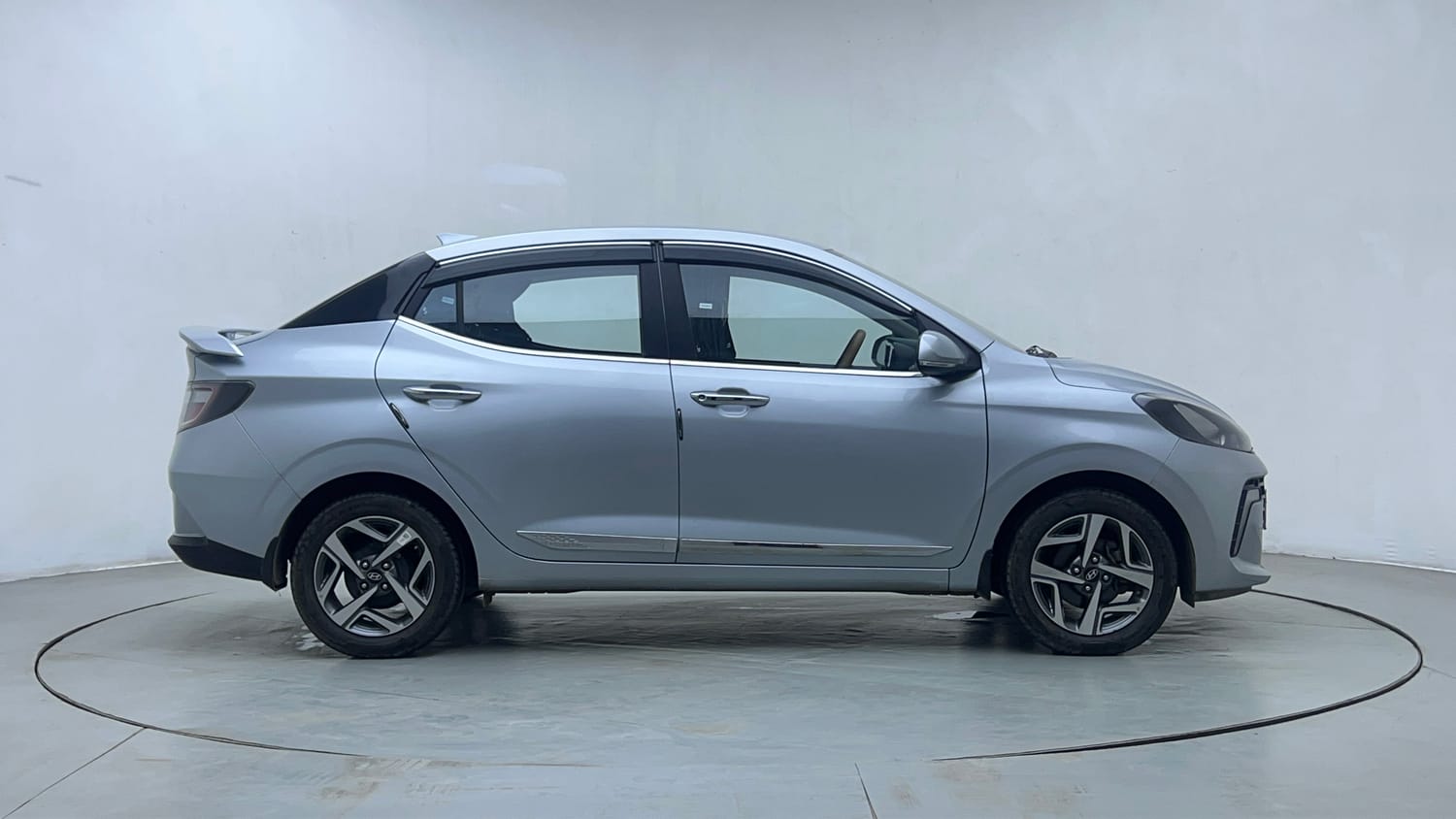 Used 2024 Hyundai Aura SX 1.2 CNG Cng Manual exterior RIGHT SIDE VIEW