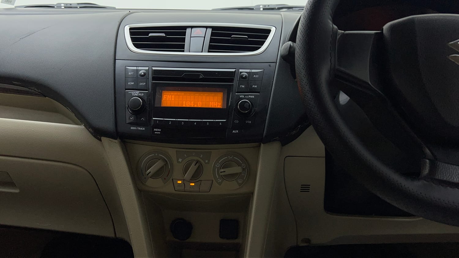 Used 2016 Maruti Suzuki Swift Dzire VXI Petrol + CNG (Outside Fitted) Cng Manual interior MUSIC SYSTEM & AC CONTROL VIEW