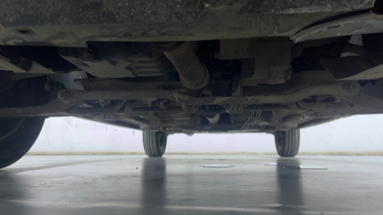 Used 2018 Tata Tiago Revotron XT Petrol Manual extra FRONT LEFT UNDERBODY VIEW
