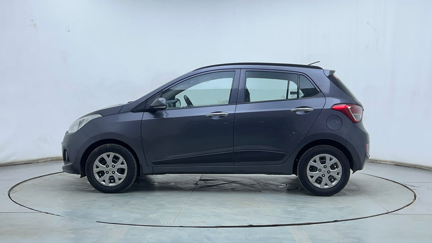 Used 2014 Hyundai Grand i10 Sportz AT 1.2 Kappa VTVT Petrol Automatic exterior LEFT SIDE VIEW