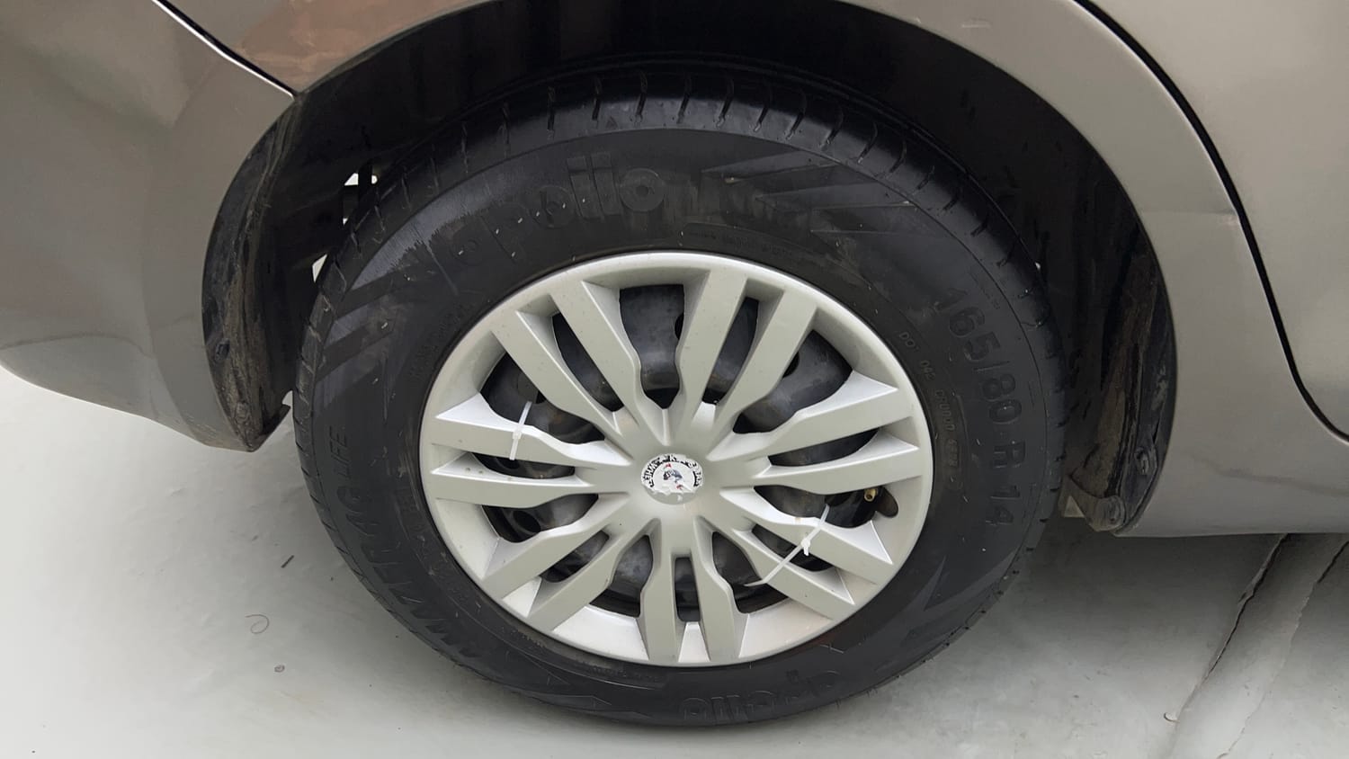 Used 2016 Maruti Suzuki Swift Dzire VXI Petrol + CNG (Outside Fitted) Cng Manual tyres RIGHT REAR TYRE RIM VIEW