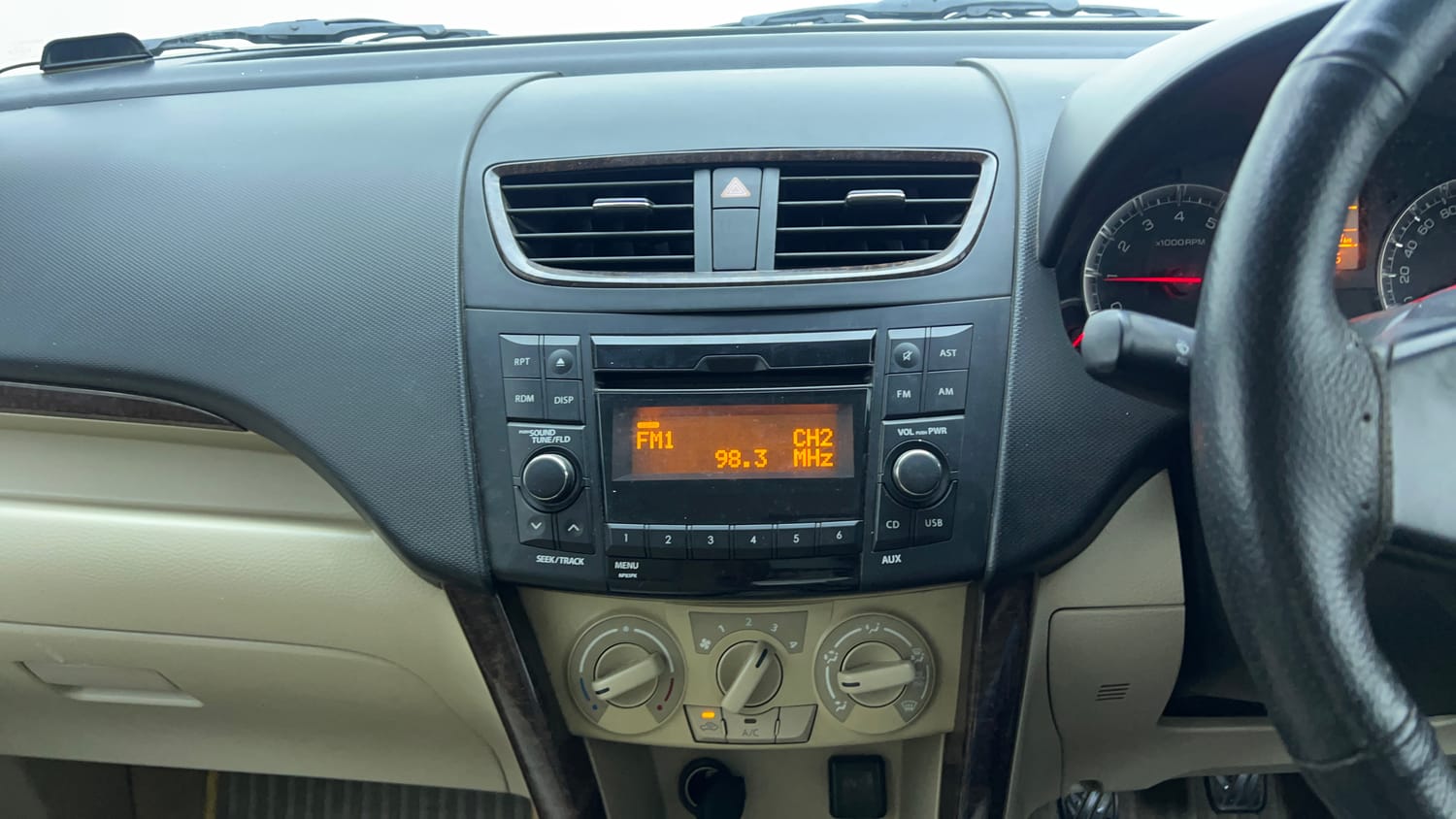 Used 2015 Maruti Suzuki Swift Dzire VXI Petrol Manual top_features Integrated (in-dash) music system