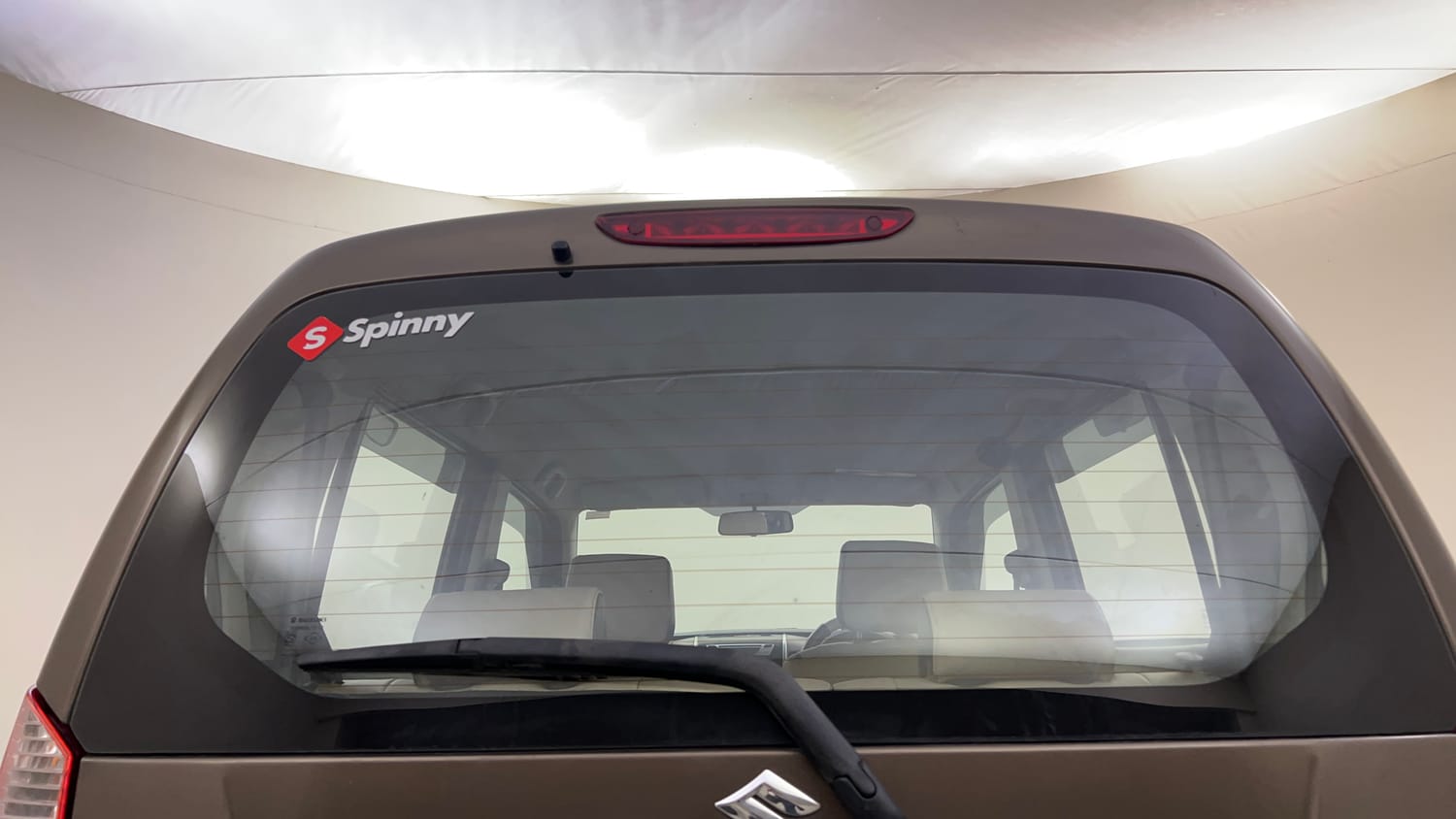 Used 2013 Maruti Suzuki Wagon R VXI Petrol Manual top_features Rear defogger