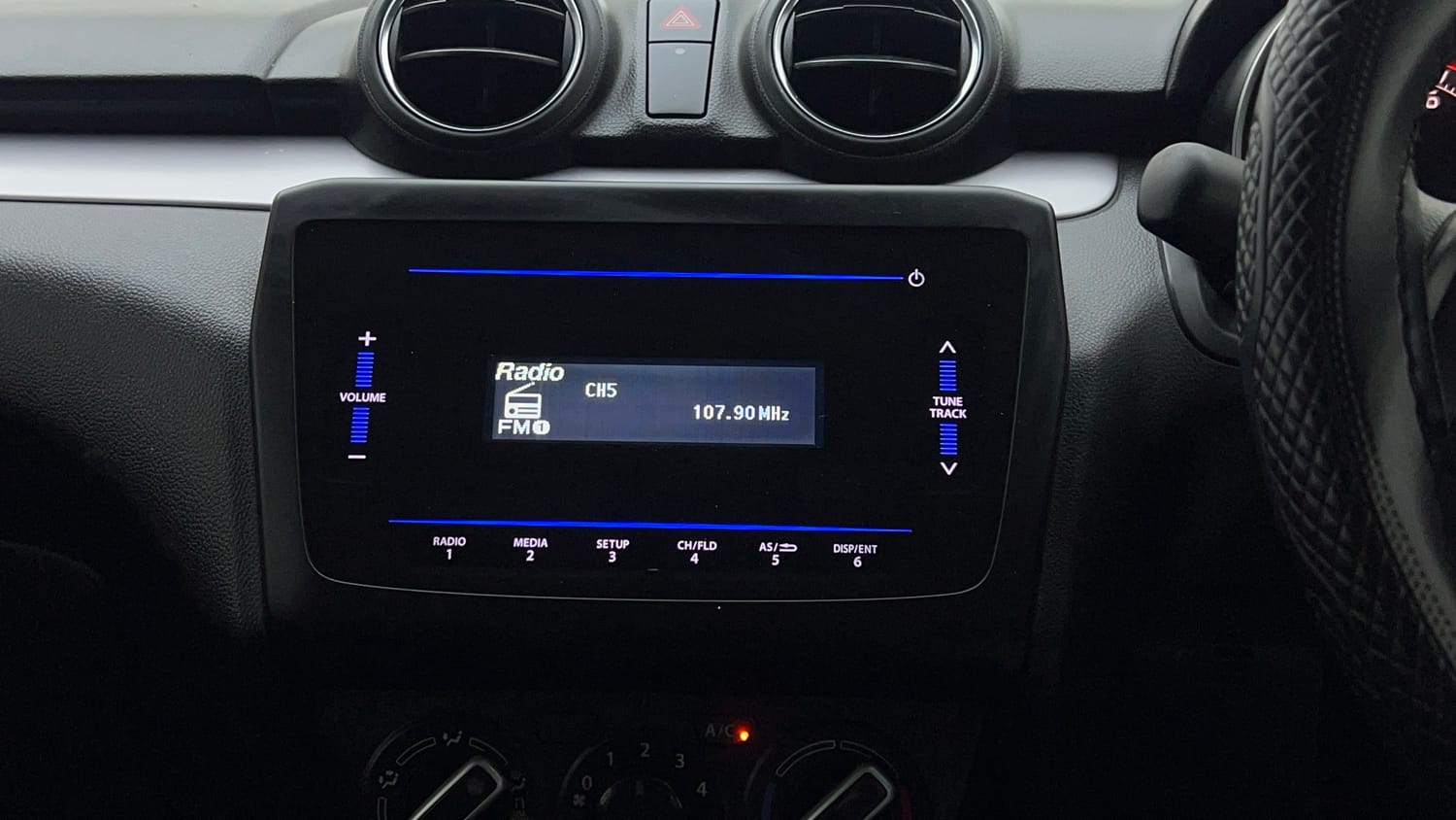 Used 2023 Maruti Suzuki Swift VXi Petrol Manual top_features Integrated (in-dash) music system