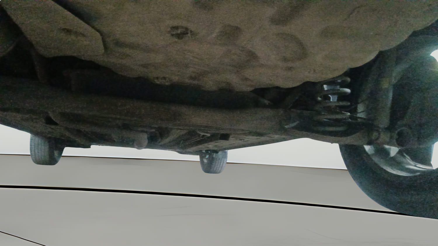 Used 2025 Nissan Magnite Tekna B4D 1.0 Petrol MT Petrol Manual extra REAR RIGHT UNDERBODY VIEW