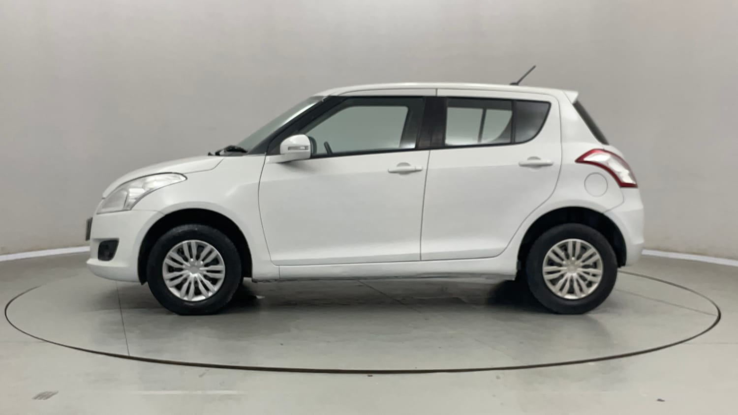 Used 2013 Maruti Suzuki Swift VXi Petrol Manual exterior LEFT SIDE VIEW