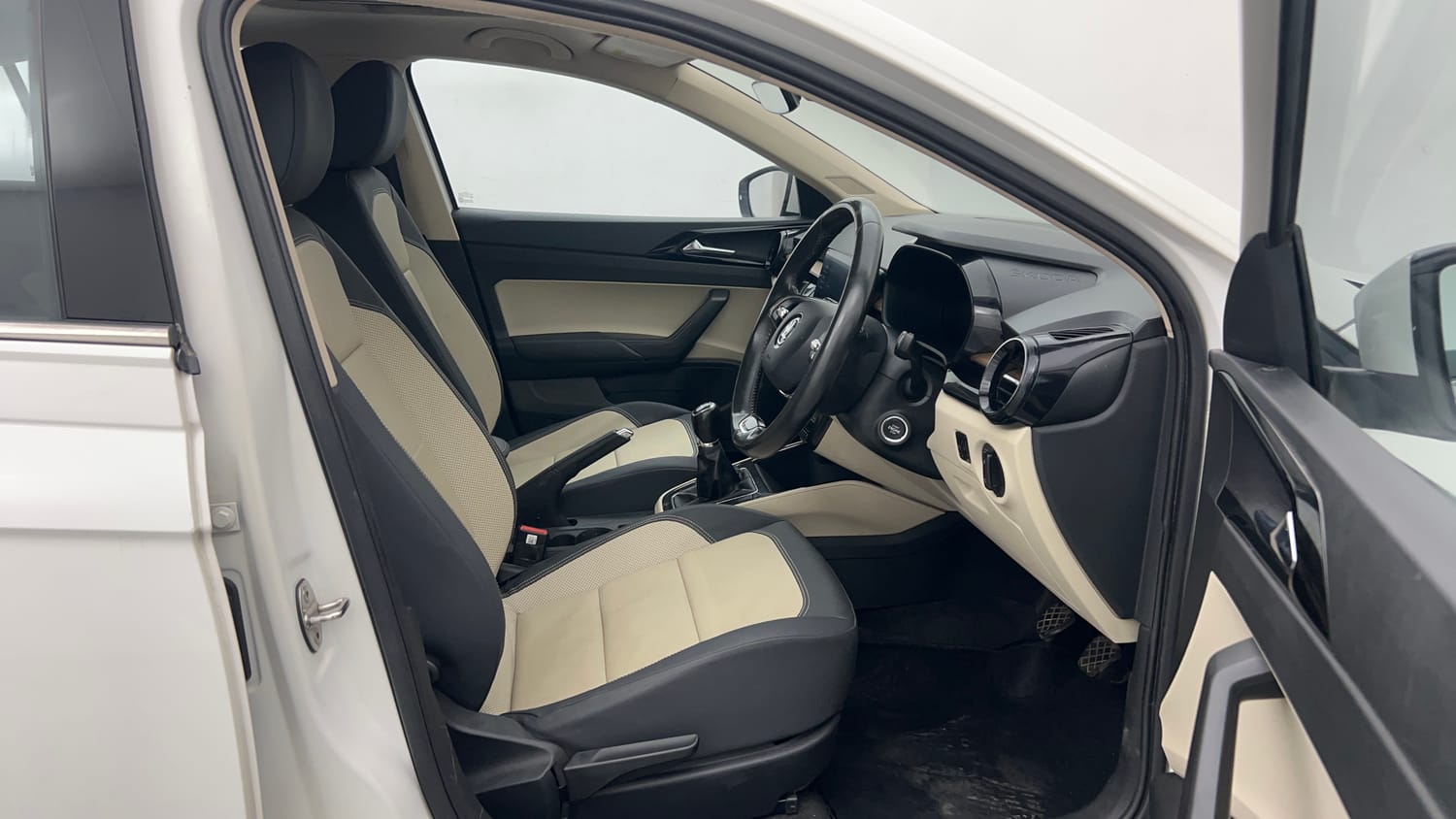 Used 2022 Skoda Slavia Style 1.0L TSI MT Petrol Manual interior RIGHT SIDE FRONT DOOR CABIN VIEW