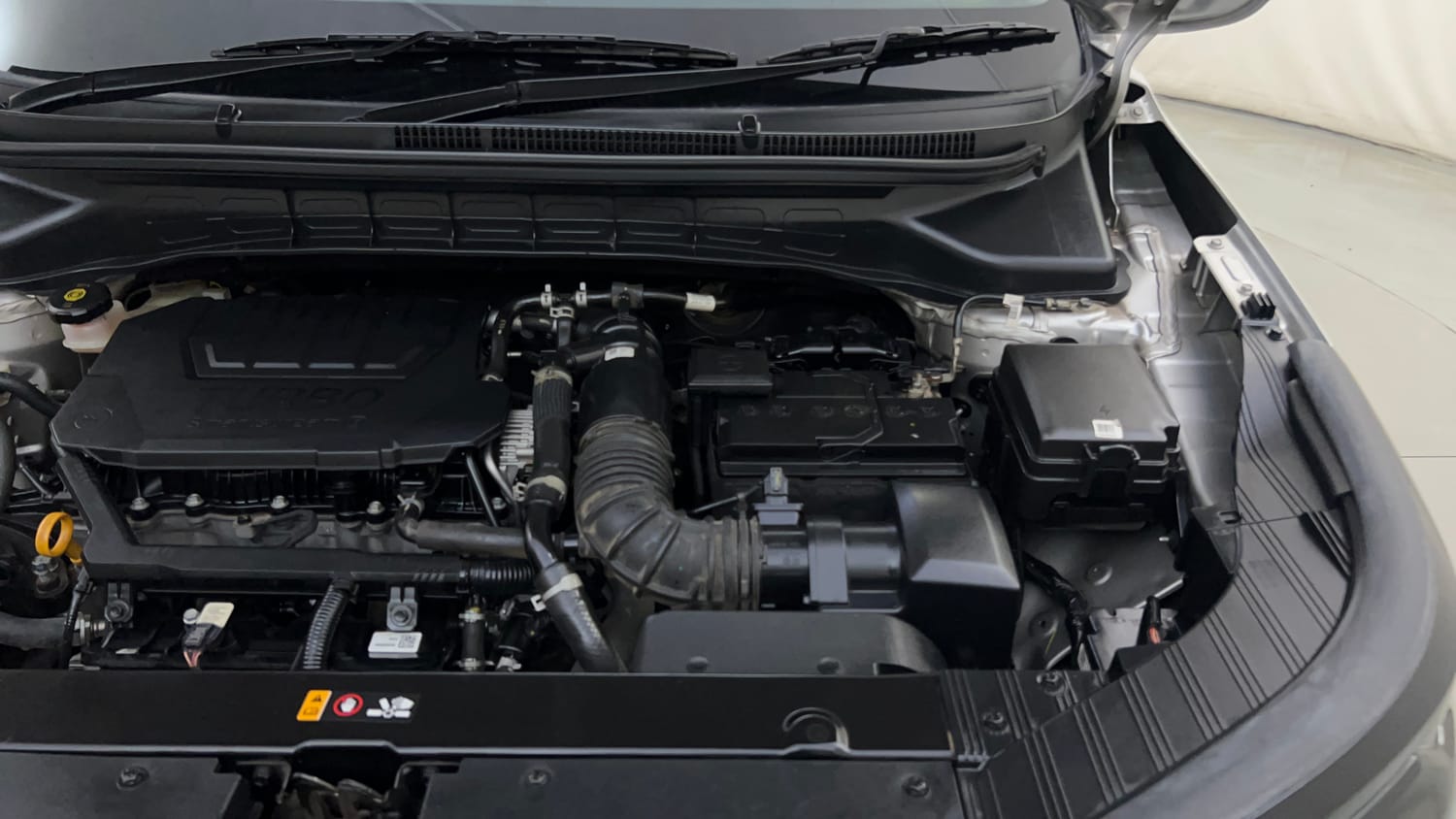 Used 2024 Kia Carens Luxury Plus 1.5 Turbo Petrol DCT 7 STR Petrol Automatic engine ENGINE LEFT SIDE HINGE & APRON VIEW