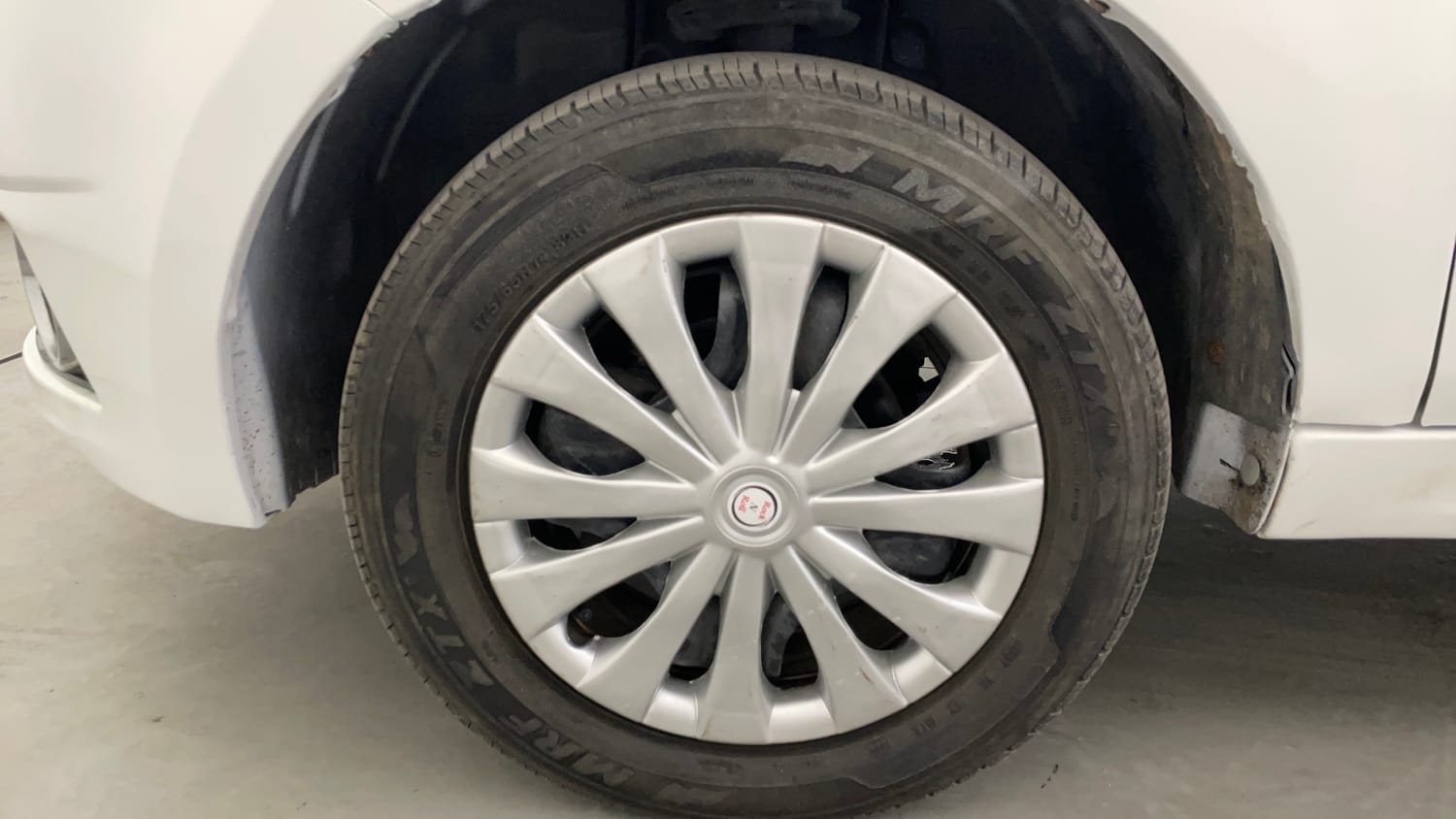 Used 2019 Tata Tiago Revotron XZ Petrol Manual tyres LEFT FRONT TYRE RIM VIEW