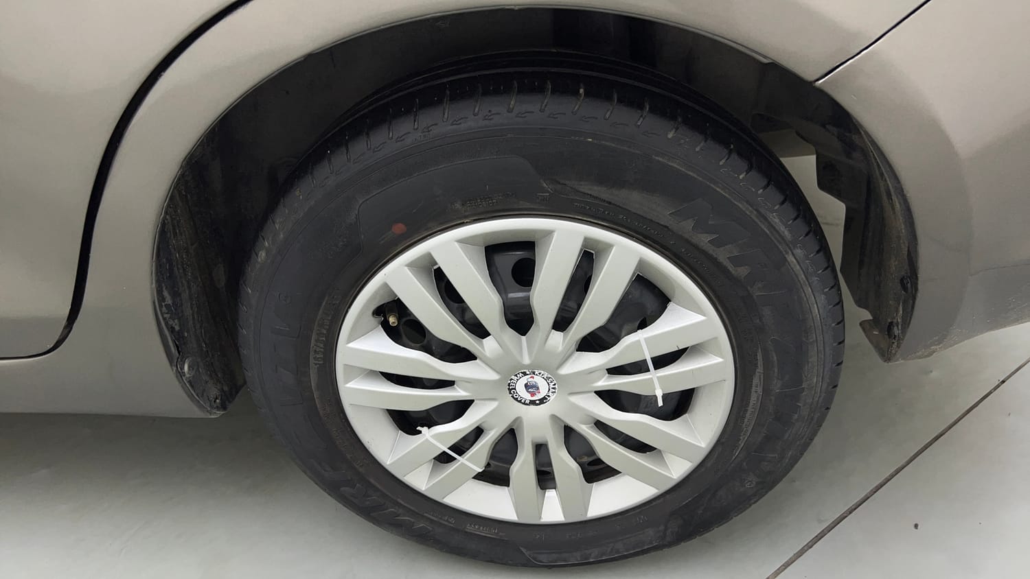 Used 2016 Maruti Suzuki Swift Dzire VXI Petrol + CNG (Outside Fitted) Cng Manual tyres LEFT REAR TYRE RIM VIEW