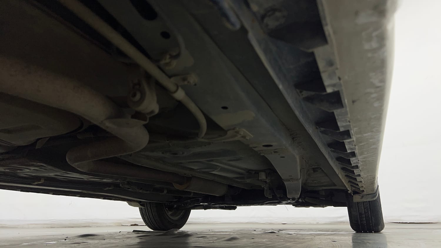 Used 2019 Maruti Suzuki XL6 Alpha MT Petrol Petrol Manual extra REAR RIGHT UNDERBODY VIEW
