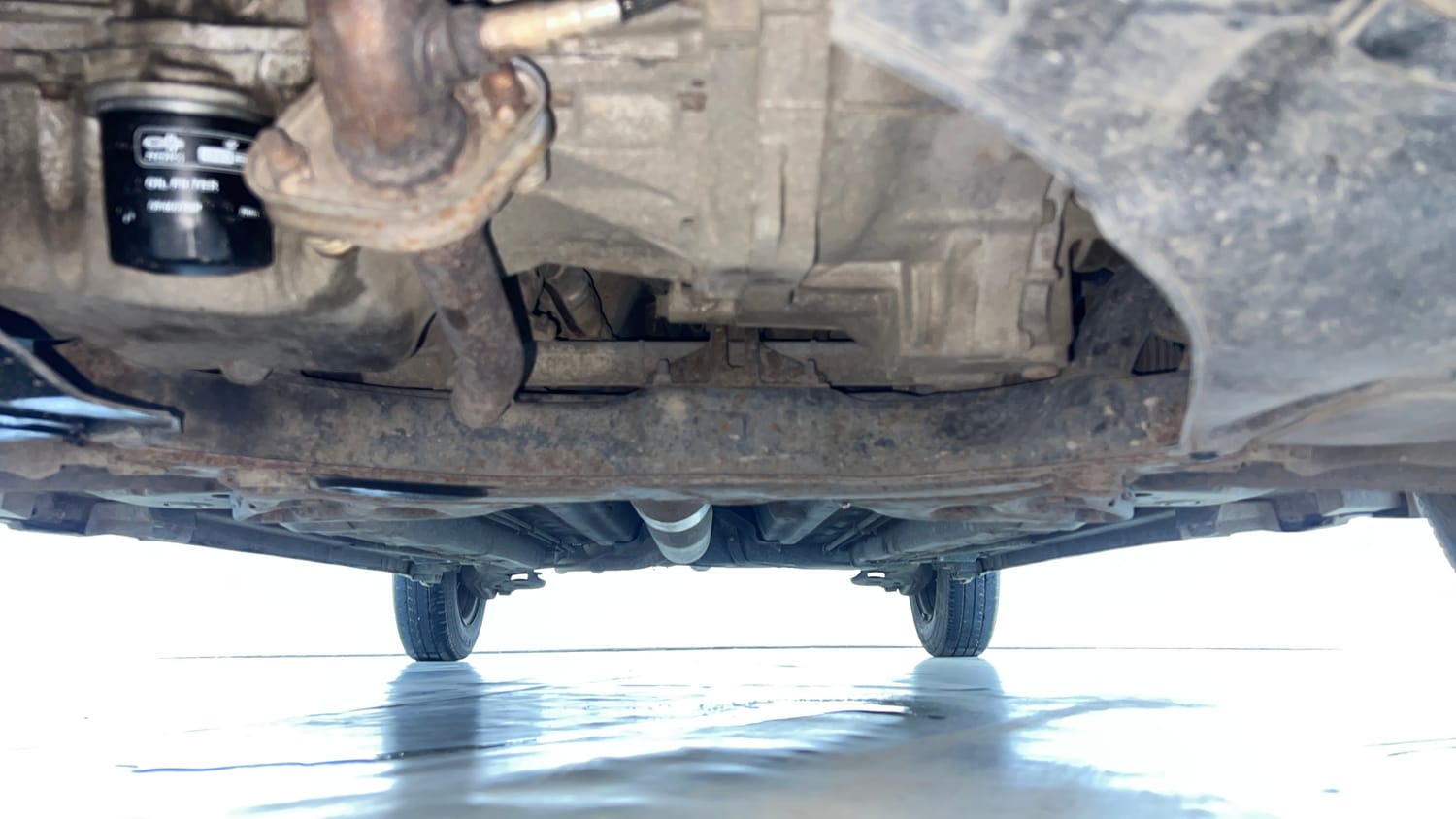 Used 2015 Maruti Suzuki Swift Dzire VXI Petrol Manual extra FRONT LEFT UNDERBODY VIEW