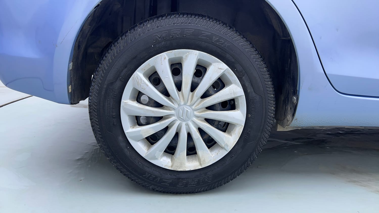 Used 2015 Maruti Suzuki Swift Dzire VXI Petrol Manual tyres RIGHT REAR TYRE RIM VIEW