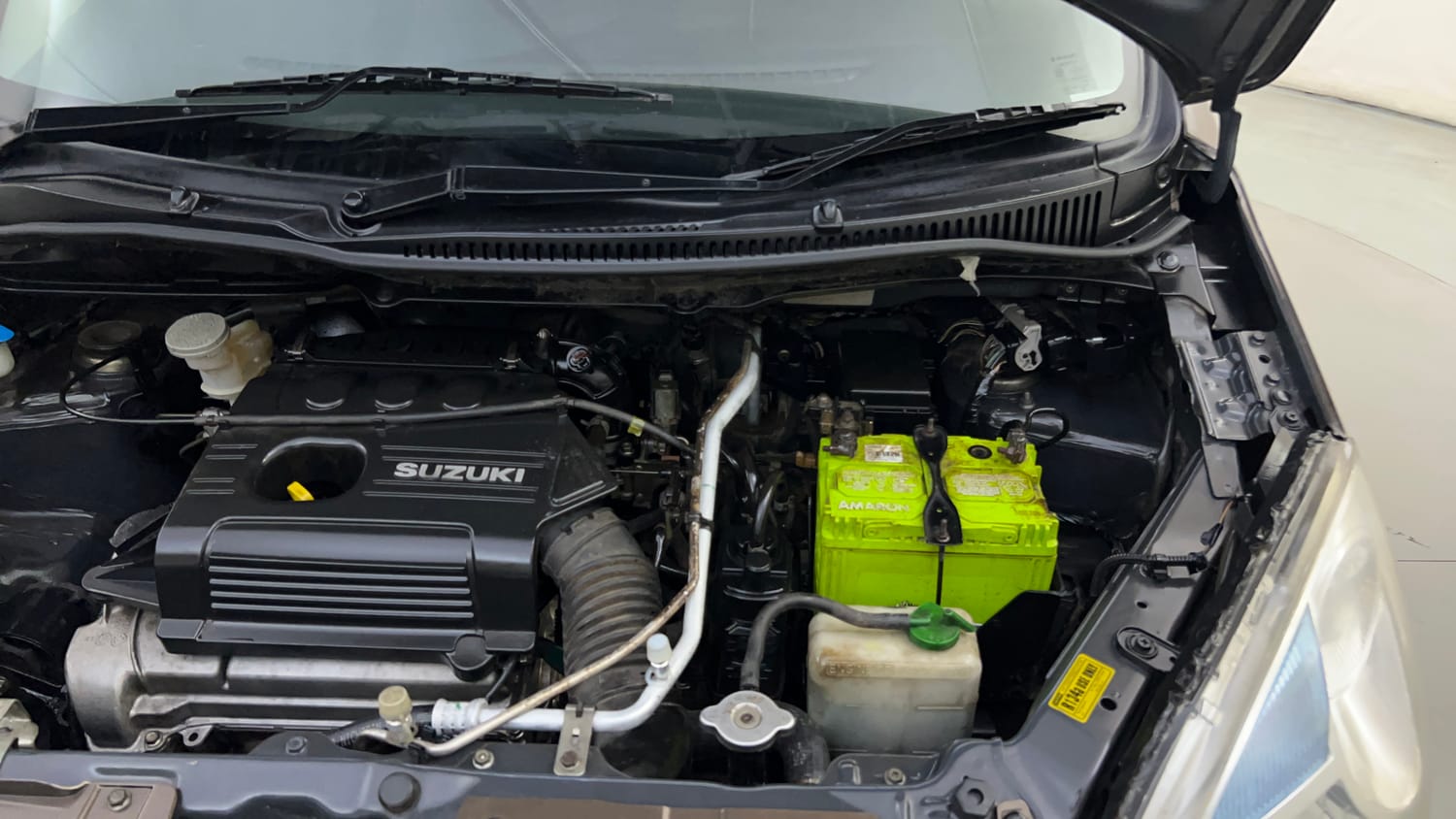 Used 2013 Maruti Suzuki Wagon R VXI Petrol Manual engine ENGINE LEFT SIDE HINGE & APRON VIEW