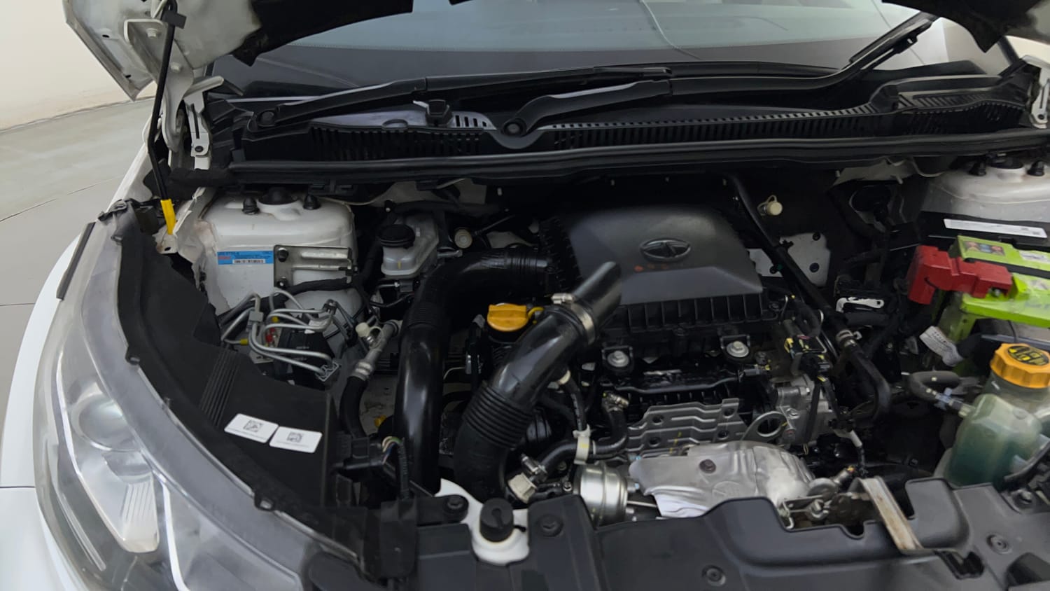 Used 2022 Tata Nexon XZA Plus (Premium) Petrol Automatic engine ENGINE RIGHT SIDE HINGE & APRON VIEW