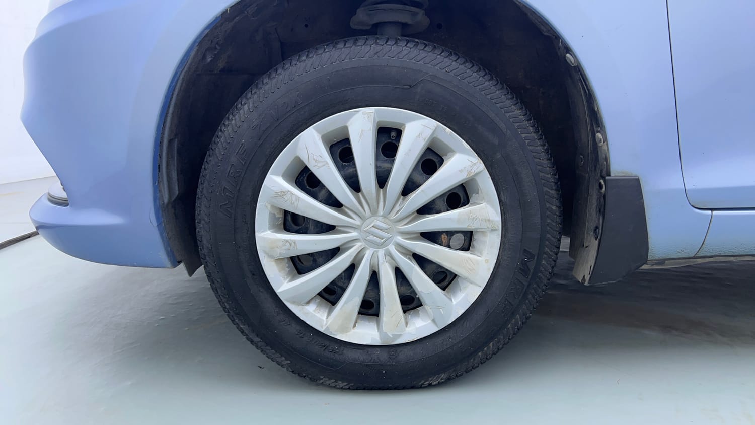 Used 2015 Maruti Suzuki Swift Dzire VXI Petrol Manual tyres LEFT FRONT TYRE RIM VIEW