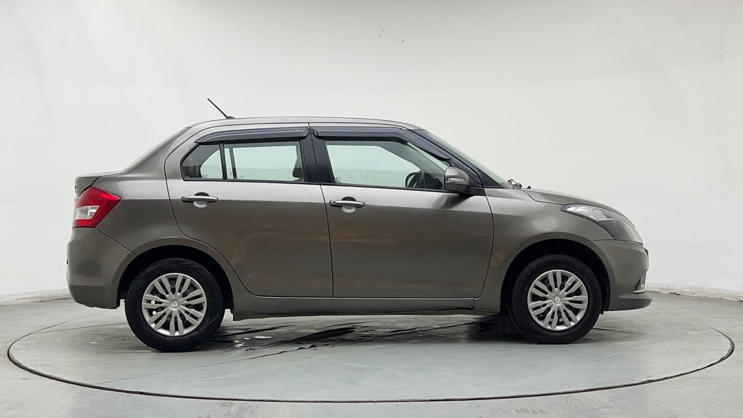 Used 2016 Maruti Suzuki Swift Dzire VXI Petrol + CNG (Outside Fitted) Cng Manual exterior RIGHT SIDE VIEW