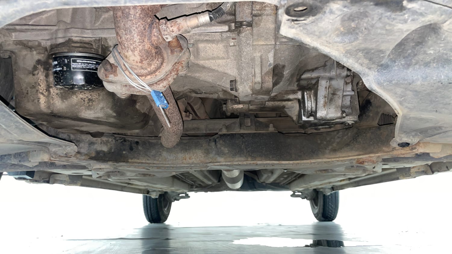 Used 2013 Maruti Suzuki Swift VXi Petrol Manual extra FRONT LEFT UNDERBODY VIEW