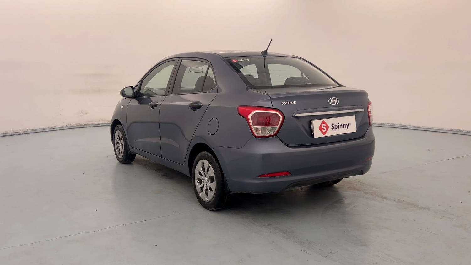 Used 2015 Hyundai Xcent Base 1.2 Petrol Manual exterior LEFT REAR CORNER VIEW