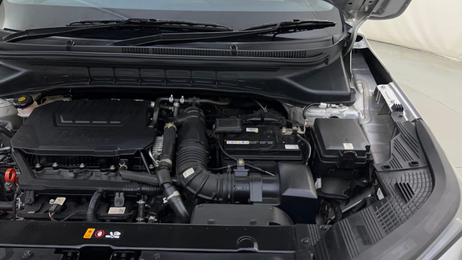 Used 2025 Kia Carens Clavis HTX Plus 1.5 Turbo Petrol 7STR MT Petrol Manual engine ENGINE LEFT SIDE HINGE & APRON VIEW
