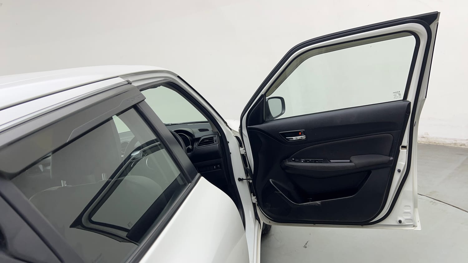 Used 2023 Maruti Suzuki Swift VXi Petrol Manual interior RIGHT FRONT DOOR OPEN VIEW